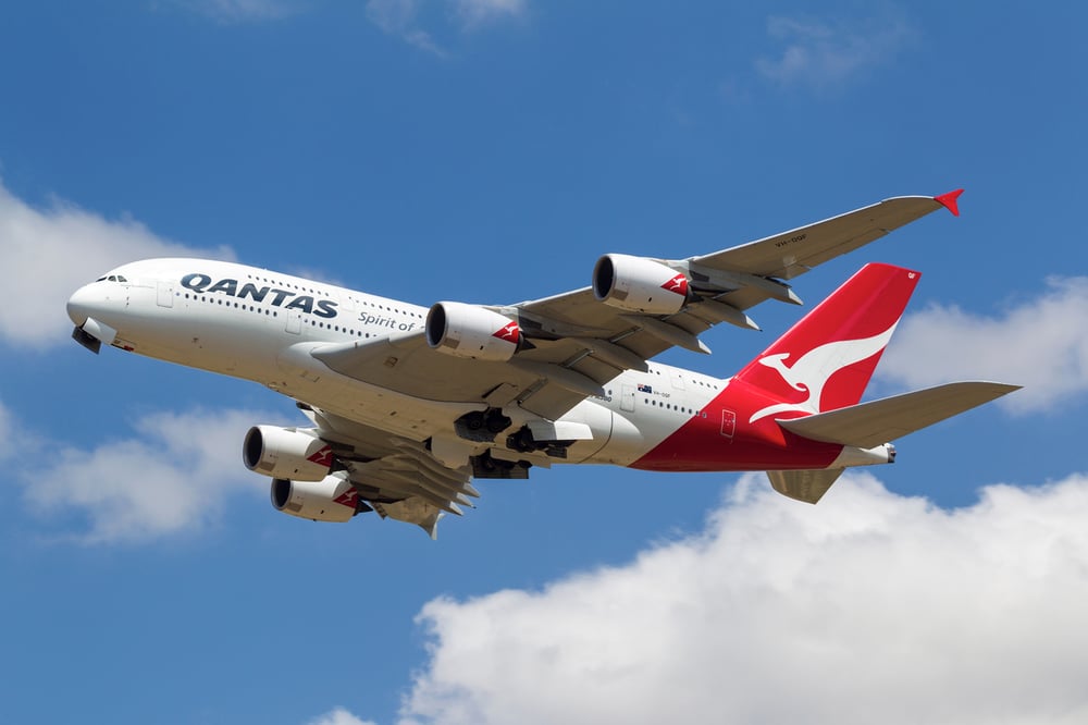 Qantas reports fourth consecutive half-yearly loss as covid delays turnaround 