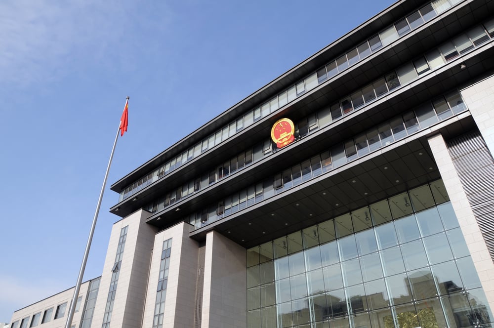 China unexpectedly cuts rates but economic data misses expectations; iron ore stocks whipsaw